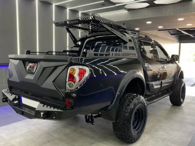 Baklämsskydd Mitsubishi L200 från 2010-2015
