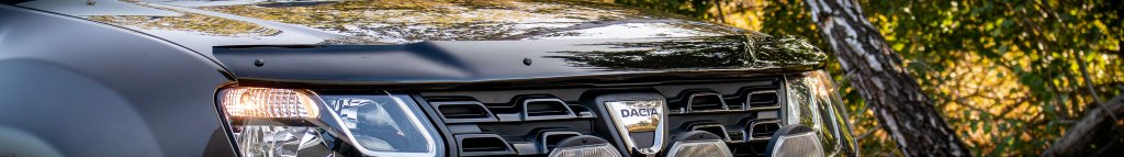 Svart genomfärgat huvskydd från CappaFe i ABS-plast monterat på brun bil